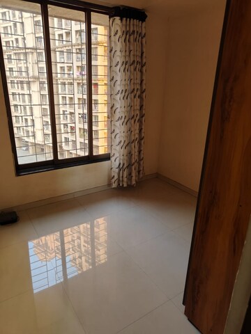 Room in 1 BHK Apartment at Bhoomi Acres, Waghbil – for Rent