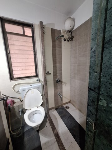 Bathroom in 2 BHK Apartment at Mohan Pride, Kalyan West – for Rent