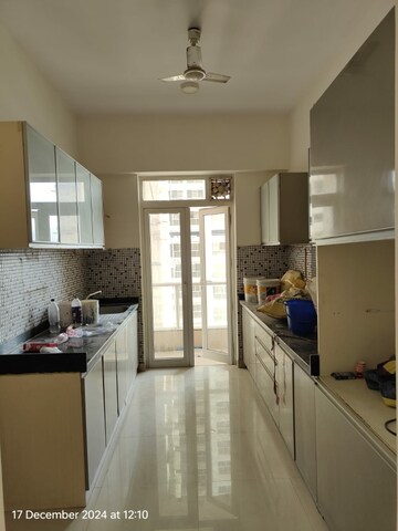 Kitchen in 3 BHK Apartment at Omkar Apartment Malad East, Malad East – for Rent
