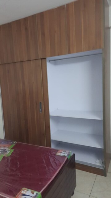 Room in 2 BHK Apartment at Paradigm Business Hermitage Park, Dhakoli Village – for Rent