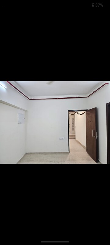 Room in 1 BHK Apartment at Omkar Signet, Malad East – for Rent