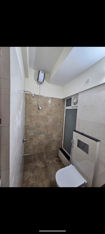 Bathroom in 1 BHK Apartment at Omkar Signet, Malad East – for Rent