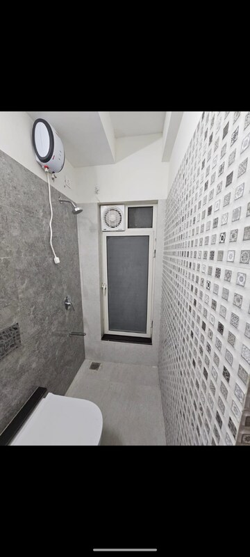 Bathroom in 1 BHK Apartment at Omkar Signet, Malad East – for Rent