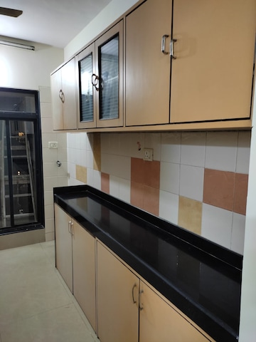 Kitchen in 2 BHK Apartment at Sai Gunina Apartment, Sanpada – for Rent