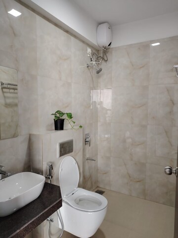 Bathroom in 2 BHK Apartment at Raymond Ten X Habitat, Pokhran Road No 2 – for Rent