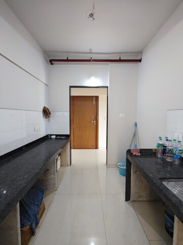 Kitchen in 2 BHK Apartment at Rustomjee Urbania, Majiwada – for Rent