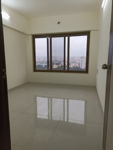 Room in 2 BHK Apartment at Mallhar Bhimashankar Heights, Dahisar West – for Rent