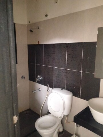 Bathroom in 2 BHK Apartment at Rama Celestial City, Ravet – for Rent