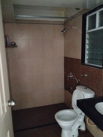 Bathroom in 2 BHK Apartment at Rama Celestial City, Ravet – for Rent
