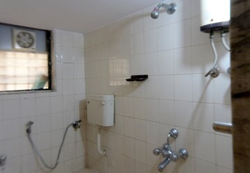 Master Bedroom in 2 BHK Apartment at Angan Apartment, Kandivali East – for Rent
