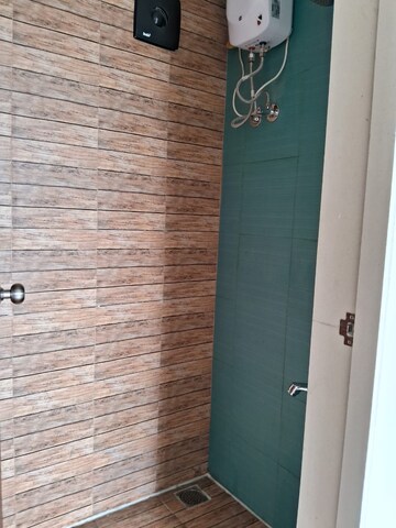 Bathroom in 1 BHK Apartment at Lodha Crown Quality Homes, Majiwada – for Rent