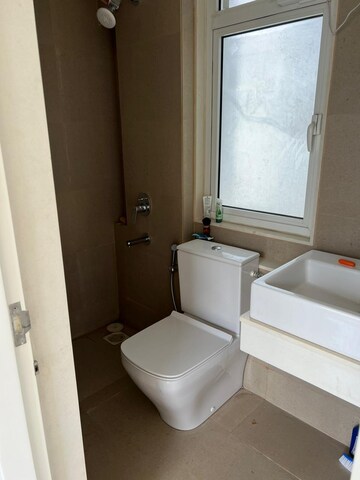 Bathroom in 1 BHK Apartment at Tata Serein, Pokhran Road No 2 – for Rent