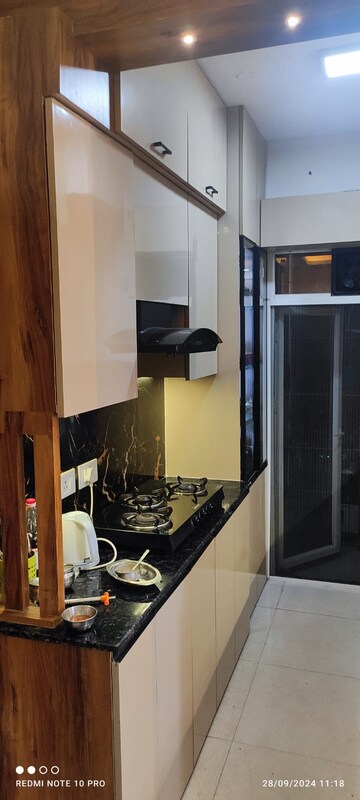 Kitchen in 3 BHK Apartment at Ramprastha Primera, Sector 37d – for Rent
