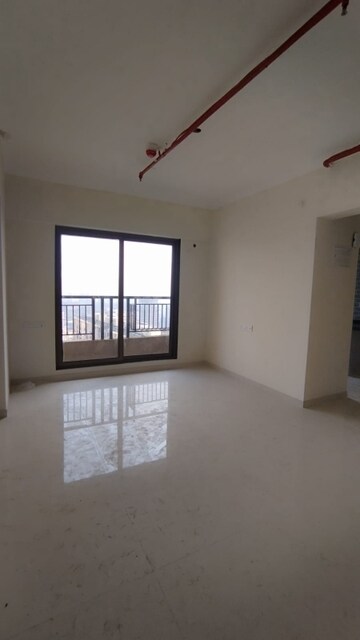 Room in 1 BHK Apartment at Raunak City Phase 2, Kalyan West – for Sale