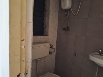 Bathroom in 2 BHK Apartment at New Krishna Tower, Kopar Khairane – for Rent