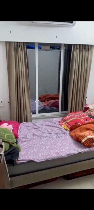 Bedroom in 2 BHK Apartment at Dimple 19 North, Kandivali West – for Rent