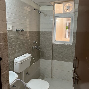 Bathroom in 2 BHK Apartment at Signature Global Orchard Avenue, Sector 93 – for Sale