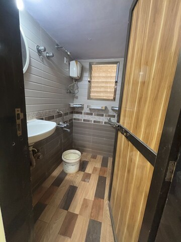 Bathroom in 1 BHK Apartment at Sadguru Complex, Mira Road – for Rent