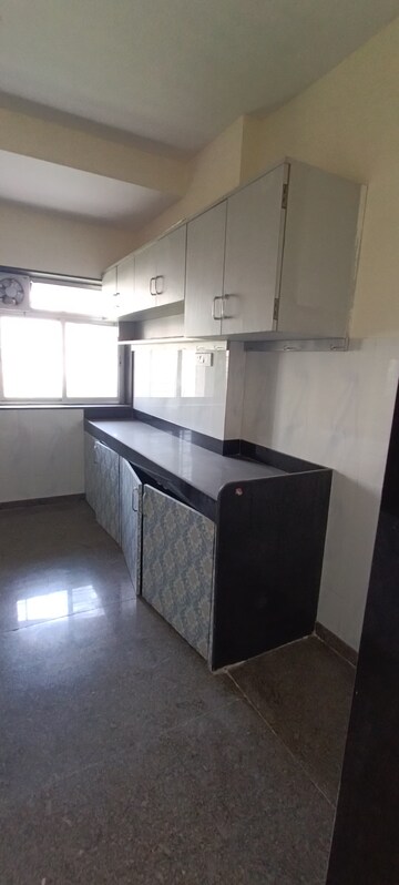 Kitchen in 3 BHK Apartment at Kalpataru Hills Phase II, Manpada – for Rent