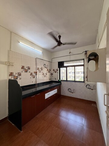 Kitchen in 1 BHK Apartment at Raj Shivam Society, Dahisar East – for Rent