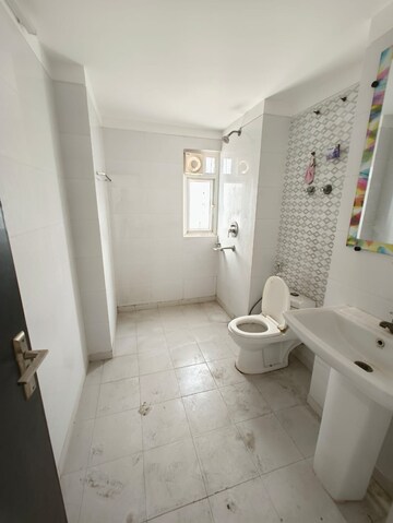Bathroom in 4 BHK Apartment at Godrej Tropical Isle, Sector 146 – for Sale