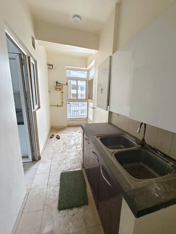 Kitchen in 4 BHK Apartment at Godrej Tropical Isle, Sector 146 – for Sale
