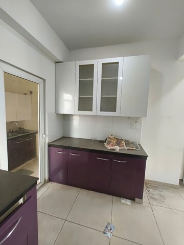 Kitchen in 4 BHK Apartment at Godrej Tropical Isle, Sector 146 – for Sale