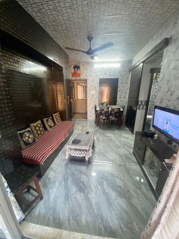 Living Room in 1 BHK Apartment at Kalpataru Hills, Manpada – for Sale