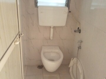 Bathroom in 3 BHK Apartment at Samarpan CHS, Mira Road – for Rent