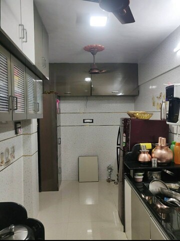Kitchen in 2 BHK Apartment at Agarwal Vrindavan Gardens, Vasai East – for Rent