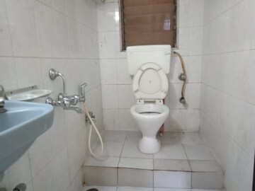 Bathroom in 3 BHK Apartment at Tulsi Apartment, Spine Road – for Sale