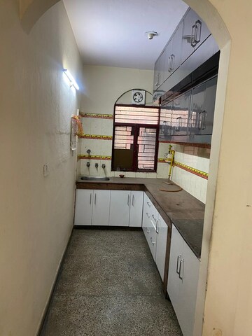 Kitchen in 2 BHK Apartment at Vasundhara Sector 11 – for Sale