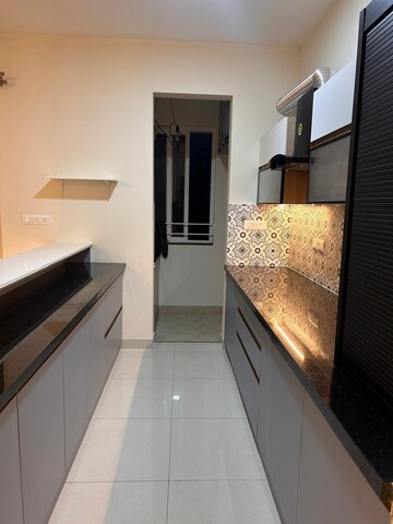 Kitchen in 2 BHK Apartment at Puravankara Purva Zenium, Hosahalli – for Rent