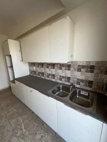 Kitchen in 2.5 BHK Apartment at Sushma Valencia, Nagla Road – for Rent