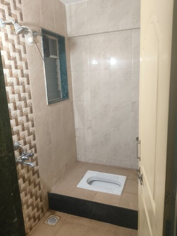 Bathroom in 2 BHK Apartment at Samruddhi Isha, Dehu Road – for Rent