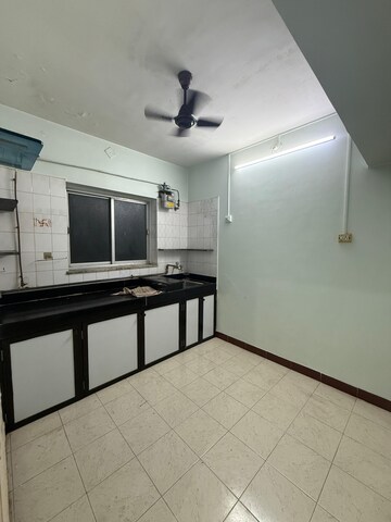 Kitchen in 1 BHK Apartment at Aashay CHS, Dahisar East – for Sale
