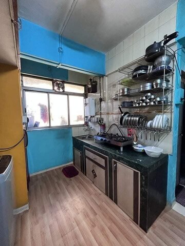 Kitchen in 2 BHK Apartment at Jeenaam Adiraj Ascent , Nalasopara East – for Rent