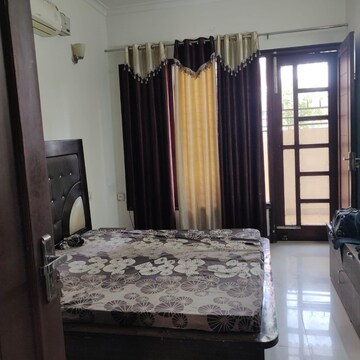Bedroom in 4 BHK Independent House at Panchsheel Enclave Plots, Dhakoli Village – for Sale