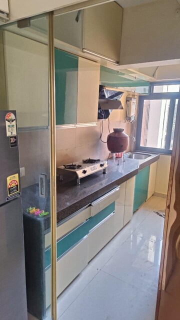 Kitchen in 2 BHK Apartment at Kanakia Rainforest, Andheri East – for Rent