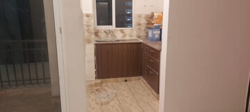 Kitchen in 2 BHK Apartment at Amrapali Golf Homes, Sector 4, Greater Noida – for Rent