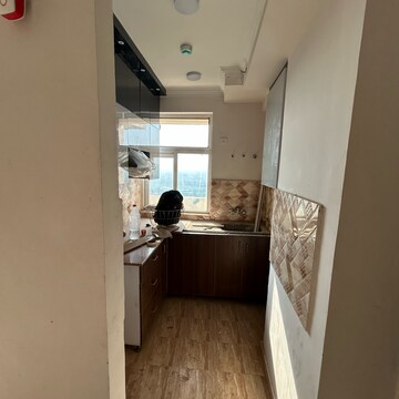 Kitchen in 2.5 BHK Apartment at Amrapali Riverview, Amrapali Leisure Valley – for Rent
