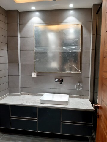 Bathroom in 4 BHK Builder Floor at Ansal Sushant Lok I, Sector 43 – for Rent