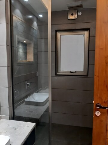 Bathroom in 4 BHK Builder Floor at Ansal Sushant Lok I, Sector 43 – for Rent
