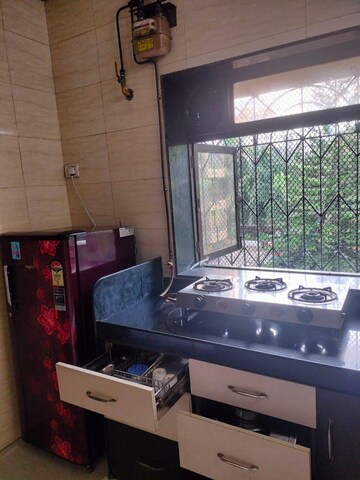 Kitchen in 1 BHK Apartment at Manpada – for Sale