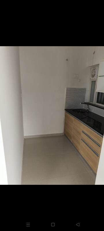 Kitchen in 2 BHK Apartment at Omkar Signet, Malad East – for Rent