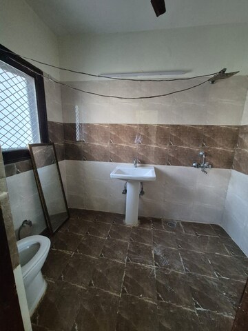 Bathroom in 4 BHK Apartment at Sector 56 – for Rent
