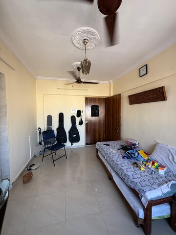 Living Room in 1 BHK Apartment at Sai Shradha Phase 2, Dahisar East – for Sale