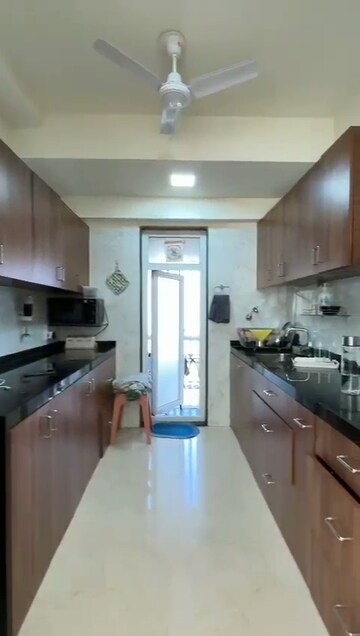 Kitchen in 2 BHK Apartment at Ruparel Ariana, Parel – for Rent