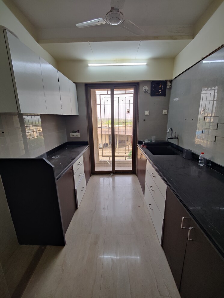 Kitchen, palacia-kingston-phase-2 2 Bedroom 669 Sq.Ft. Apartment In Ghodbunder Road Thane 8050504