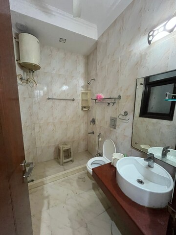 Bathroom in 3 BHK Builder Floor at Ansal Sushant Lok I, Sector 43 – for Rent